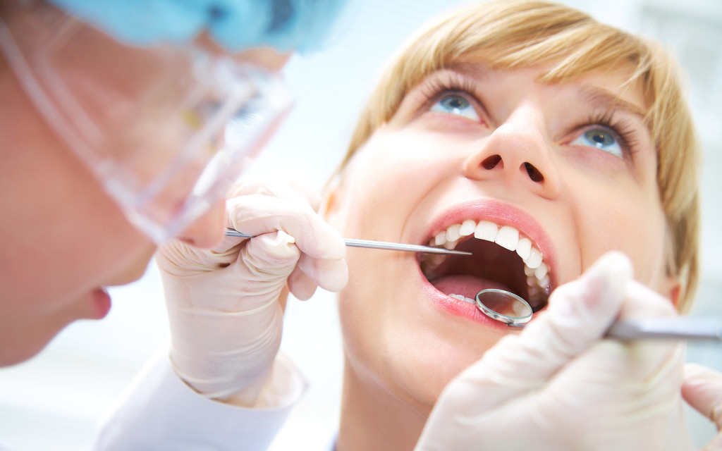 Посетите стоматолога для лечения флюса